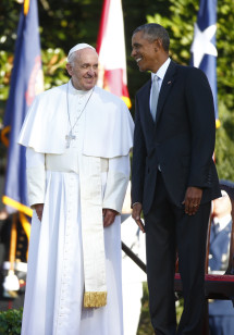 President Barack Obama stands with Pope Francis (L) as the pontiff is welcomed to the White House during a ceremony in Washington on Sept 23, 2015. (Reuters)