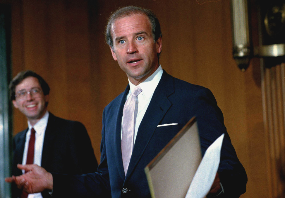 Sen. Joe Biden (D-Del.) takes a break from the  confirmation hearings for Supreme Court justice nominee Antonin Scalia on Aug. 7, 1986. (AP)