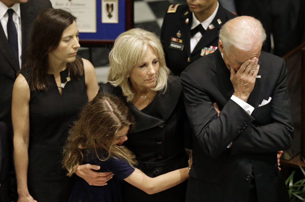 U.S. Vice President Joe Biden, right, rests his head in his hand during a viewing for his son, Beau Biden, June 4, 2015 (AP) 