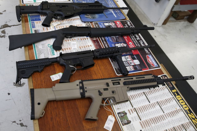 Guns for sale are displayed in Roseburg Gun Shop in Roseburg, Oregon on Oct. 3, 2015. (Reuters)