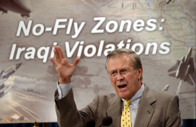 Defense Secretary Donald H. Rumsfeld criticizes Iraq for continuing to fire on U.S. and British warplanes patrolling over two no-fly zones at a Pentagon press briefing on Sept. 30, 2002. (AP/File)