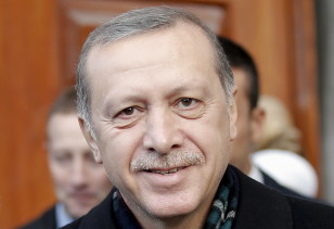 Turkish President Tayyip Erdogan smiles as he leaves a mosque in Istanbul on Nov. 2, 2015. 