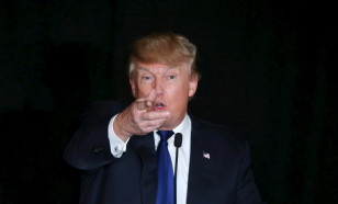 Donald Trump gestures as he speaks at the meeting of the New England Police Benevolent Association in Portsmouth, New Hampshire December 10, 2015.     REUTERS
