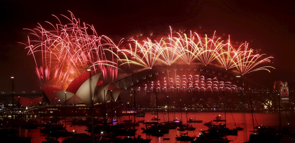 Fireworks explode over the Sydney Opera House and Harbour Bridge as Australia's largest city ushers in the New Year, January 1, 2016.  (Reuters)