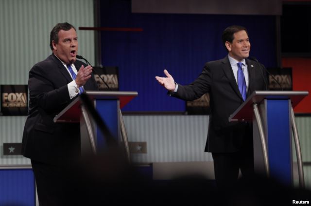 Republican presidential candidates Chris Christie (L) and Marco Rubio speak simultaneously during the Republican presidential debate in North Charleston, S.C., Jan. 14, 2016.