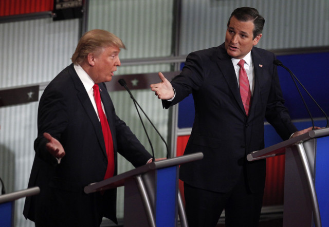 Republican presidential candidates Donald Trump (L) and Ted Cruz speak simultaneously during the Republican presidential debate in North Charleston, SC, Jan. 14, 2016. Reuters 