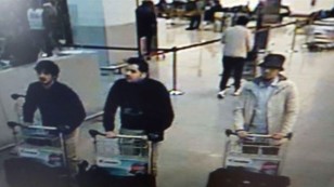 Photo released by Belgian federal police on demand of Federal prosecutor shows screengrab of airport CCTV camera showing suspects of this morning's attacks at Brussels Airport, in Zaventem, March 22, 2016. (AFP)