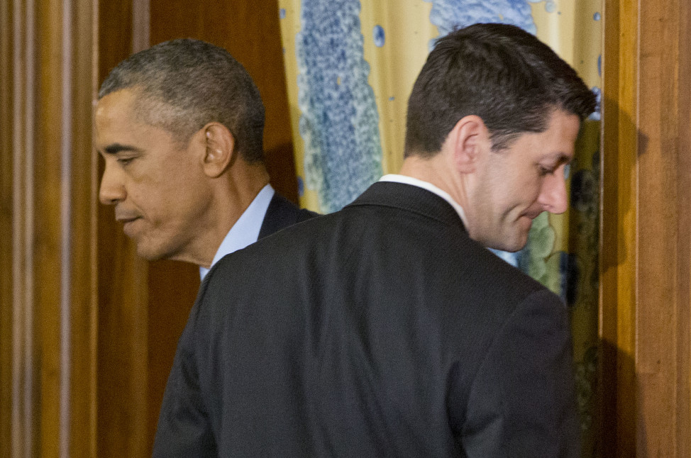 President Barack Obama, left, and House Speaker Paul Ryan of Wis., right, walk past each put during a lunch celebrating St. Patrick's Day in Washington on March 15, 2016. (AP)