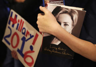 A supporter hold a copy of Hillary Clinton's book while waiting to enter a campaign event on Feb. 26, 2016 in Atlanta. (AP)