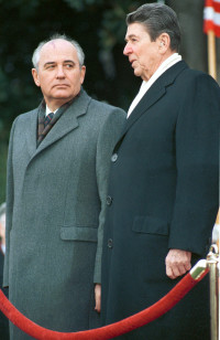 President Ronald Reagan (R) stands with then Soviet President Mikhail Gorbachev at the White House in this Dec. 8, 1987. file photo. (Reuters)