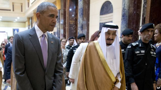 President Barack Obama and Saudi Arabia's King Salman walk together to a meeting at Erga Palace in Riyadh, Saudi Arabia, April 20, 2016.