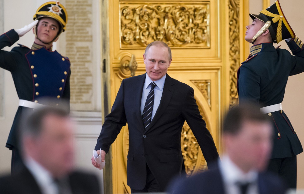 Russian President Vladimir Putin enters a hall before a meeting on the preparations for the upcoming Victory Day, marking the anniversary of the victory over Nazi Germany in World War Two, at the Kremlin in Moscow, Russia, April 5, 2016.  (Reuters) 