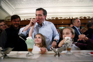 Republican presidential candidate Ted Cruz samples ice creeam with his daughters at a campaign event in Columbus, Indiana on April 25, 2016. (Reuters)