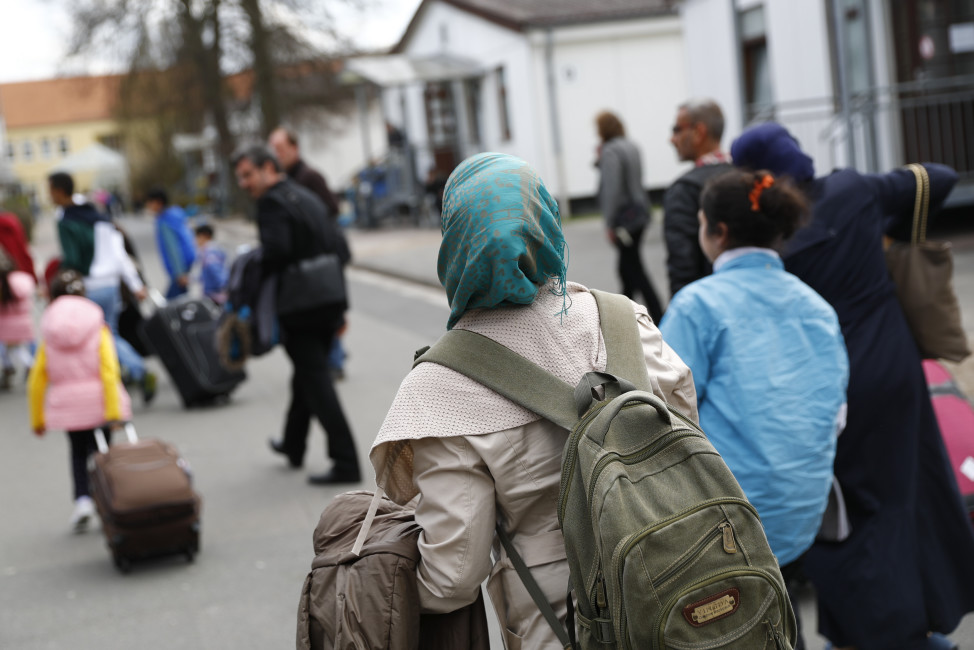 Syrian refugees arrive at camp in Friedland, Germany on April 4, 2016. (Reuters)