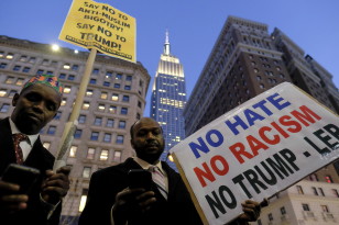 New York City's famed Empire State Building is seen protesters rally against Republican presidential candidate Donald Trump in Manhattan on Dec. 20, 2015. (Reuters)