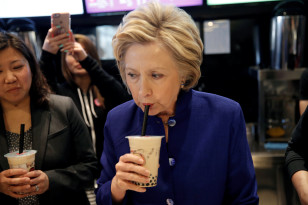 Democratic presidential candidate Hillary Clinton drinks a bubble tea drink during a campaign stop at  a restaurant in New York on  April 18, 2016. (Reuters)