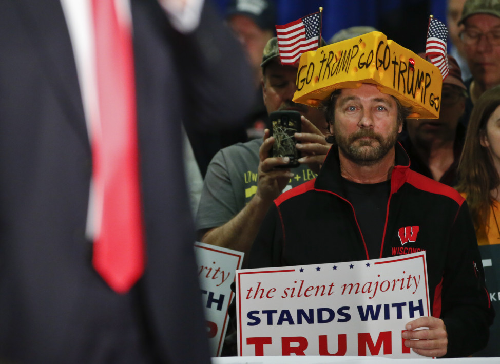 A supporter listens to Republican presidential candidate Donald Trump  during a town hall event in La Crosse, Wisconsin April 4, 2016. (Reuters)