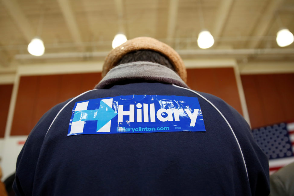 An attendee wears a sticker on his jacket in support of U.S. Democratic presidential candidate Hillary Clinton during a rally at La Escuelita School in Oakland, California, U.S., May 6, 2016.  (Reuters) 