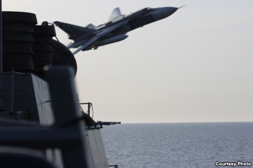 Image of Russian fly-over near guided-missile destroyer USS Donald Cook in Baltic Sea as provided by the U.S. Navy 6th Fleet. (U.S. Navy Photo) 