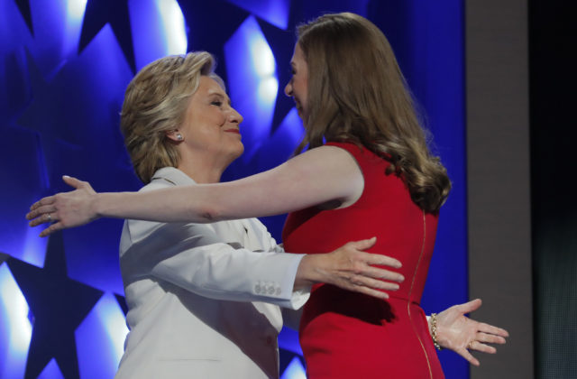 Democratic presidential nominee Hillary Clinton hugs her daughter Chelsea as she arrives to accept the nomination on the fourth and final night at the Democratic National Convention in Philadelphia, Pennsylvania, U.S. July 28, 2016. (Reuters)
