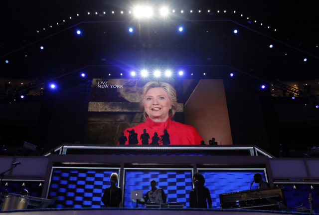 Democratic Presidential candidate Hillary Clinton appears on the screen during the second day session of the Democratic National Convention in Philadelphia, Tuesday, July 26, 2016. (AP) 