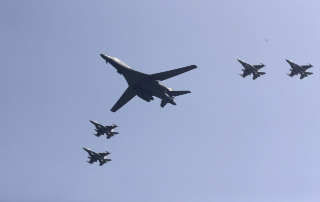 U.S. B-1 bomber, center, flies over Osan Air Base with U.S. jets in Pyeongtaek, South Korea, Tuesday, Sept. 13, 2016. The United States has flown nuclear-capable supersonic bombers over ally South Korea in a show of force meant to cow North Korea after its fifth nuclear test and also to settle rattled nerves in the South. (AP) 