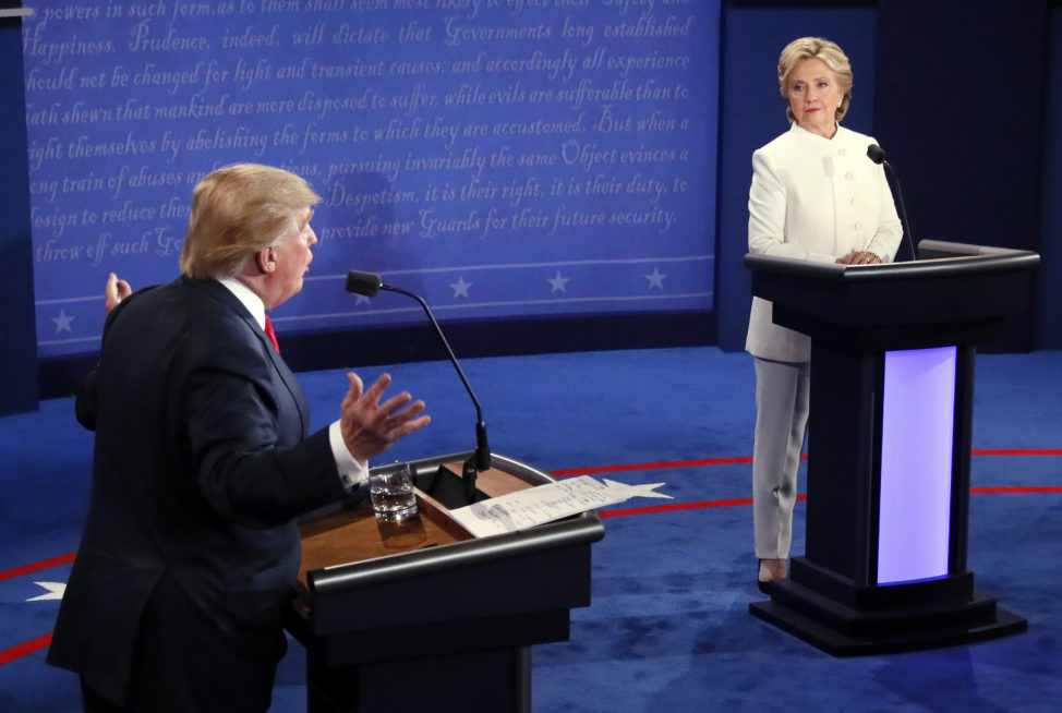 Democratic presidential nominee Hillary Clinton and Republican presidential nominee Donald Trump debate during the third presidential debate at UNLV in Las Vegas, Oct. 19, 2016. (AP)