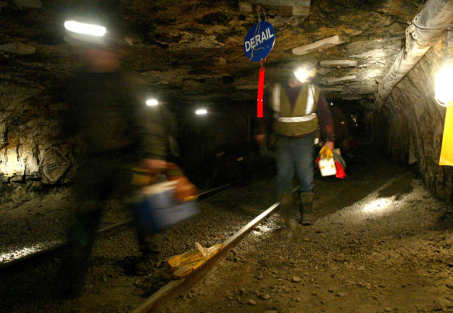 In this March 10, 2006 file photo, Ohio coal miners head into the mine for a shift inside the Hopedale Mine near Cadiz, Ohio.   (AP Photo/Joe Maiorana, File)