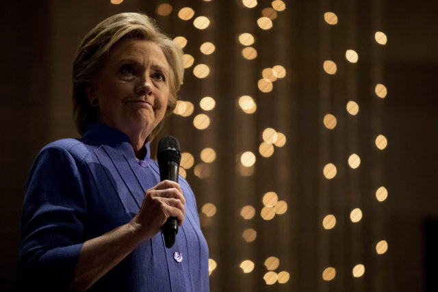 Democratic presidential candidate Hillary Clinton pauses while speaking at New Mount Olive Baptist Church in Fort Lauderdale, Fla. Oct. 30, 2016. (AP) 