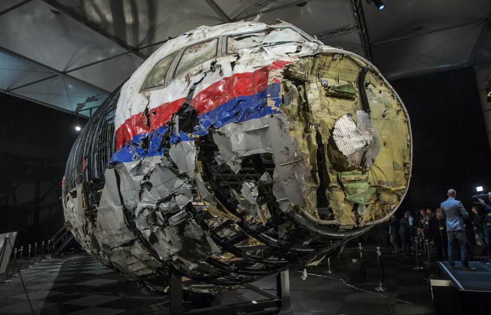 The reconstructed wreckage of the MH17 airplane is seen after the presentation of the final report into the crash of July 2014 of Malaysia Airlines flight MH17 over Ukraine, in Gilze Rijen, the Netherlands, October 13, 2015. Malaysian Airlines Flight 17 was shot down over eastern Ukraine by a Russian-made Buk missile, the Dutch Safety Board said on Tuesday in its final report on the July 2014 crash that killed all 298 aboard. The long-awaited findings of the board, which was not empowered to address questions of responsibility, did not specify who launched the missile. (Reuters) 