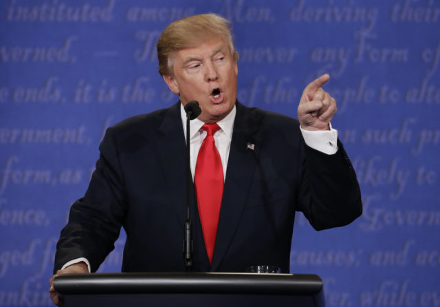 Republican presidential nominee Donald Trump speaks to Democratic presidential nominee Hillary Clinton during the third presidential debate at UNLV in Las Vegas, Oct. 19, 2016. (AP)