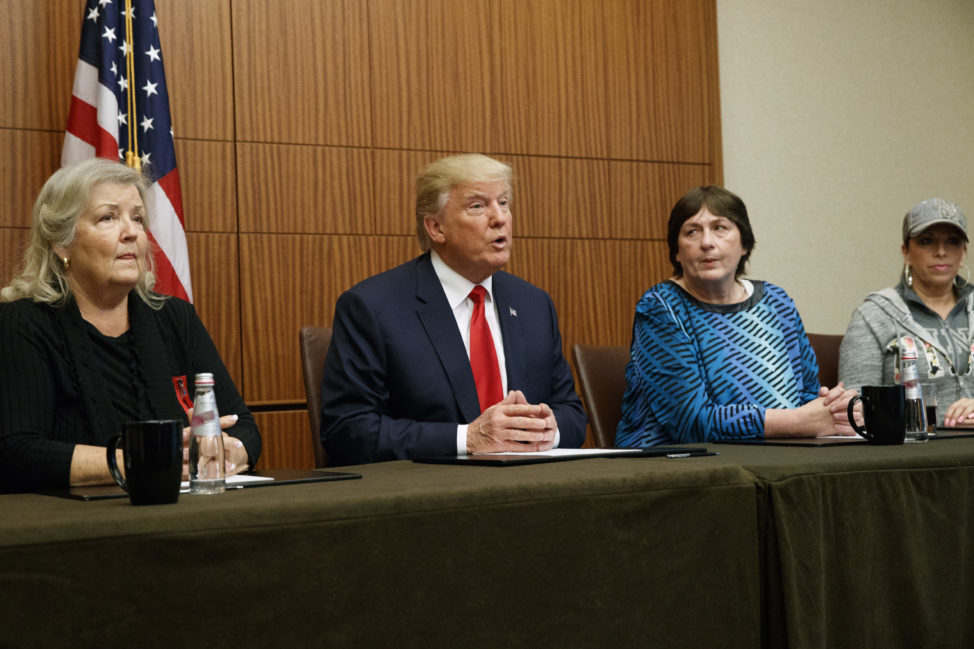 Republican presidential candidate Donald Trump makes remarks before the second presidential debate with two women who have accused former president Bill Clinton of sexual assault. From right, Paula Jones, Kathy Shelton, Trump, and Juanita Broaddrick. Shelton alleged she was raped at age 12 by a 41-year old man who Hillary Clinton was assigned to defend. Oct. 9, 2016, in St. Louis. 