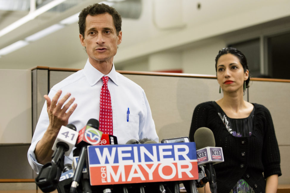 In this July 23, 2013 file photo, then-New York mayoral candidate Anthony Weiner speaks during a news conference alongside his wife Huma Abedin in New York. The FBI informed Congress on Friday, Oct. 28, 2016, it is investigating whether there is classified information in new emails that have emerged in its probe of Hillary Clinton's private server. The newly discovered emails emerged through the FBI’s separate sexting probe of Weiner, the now estranged husband of Abedin, a close confidant of Clinton. (AP) 