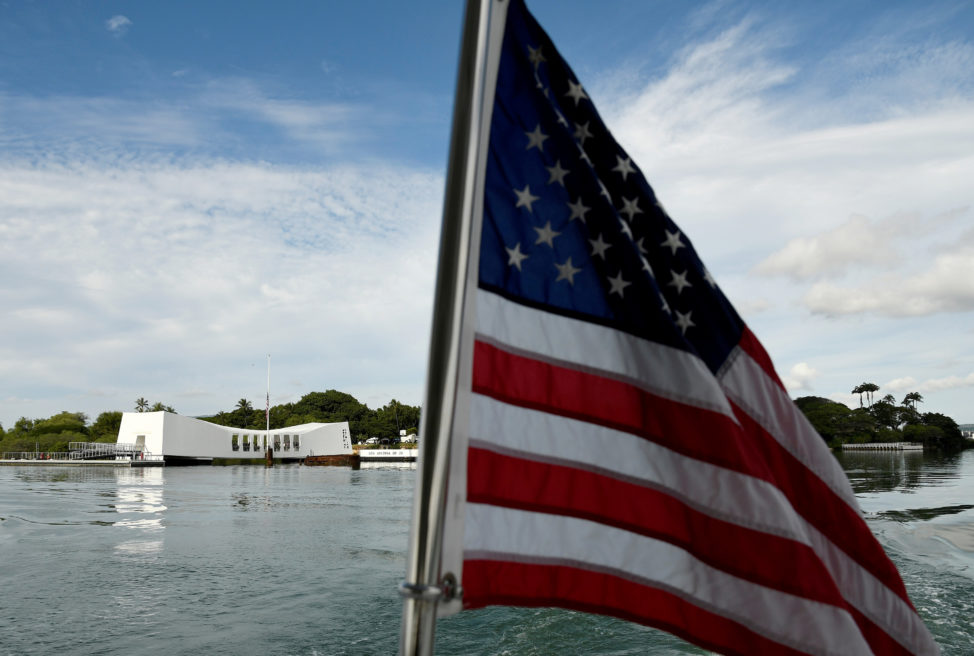 The USS Arizona Memorial can be seen from a shuttle boat during the 75th anniversary of the attack on Pearl Harbor in Honolulu, Hawaii December 7, 2016. (Reuters) 