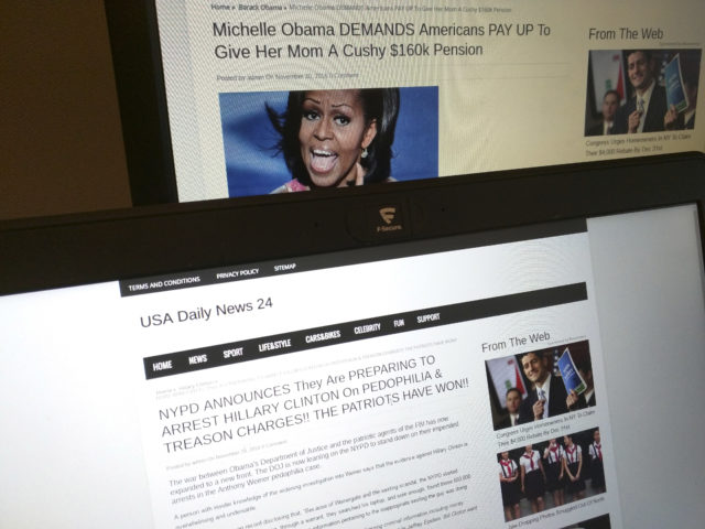 This photograph taken in Paris Friday Dec. 2, 2016 shows stories from USA Daily News 24, a fake news site registered in Veles, Macedonia. An Associated Press analysis using web intelligence service Domain Tools shows that USA Daily News 24 is one of roughly 200 U.S.-oriented sites registered in Veles, which has emerged as the unlikely hub for the distribution of disinformation on Facebook. Both stories shown here are bogus. (AP Photo/Raphael Satter)